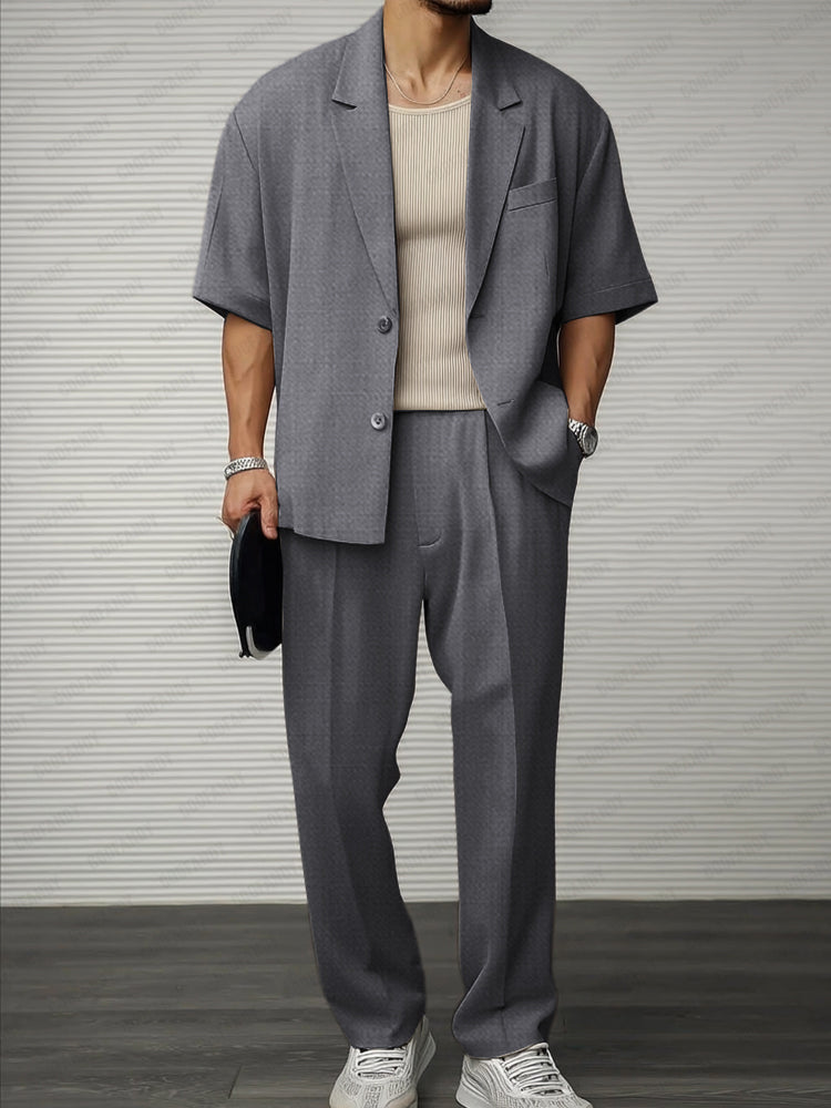 Mans kortärmad blazer och byxensemble för formella och sociala evenemang