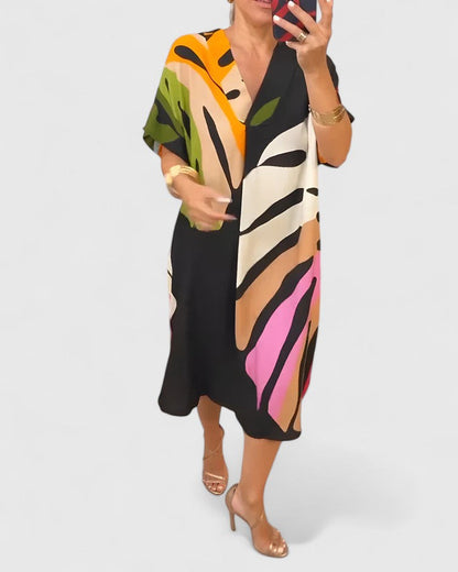 Cymarie | Chic Klänning i Tyg för Alla Tillfällen