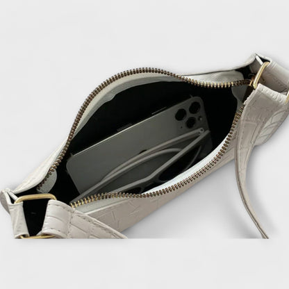 Olivia - Glansig Vegansk Läderhandväska för Stilsäkra Utflykter