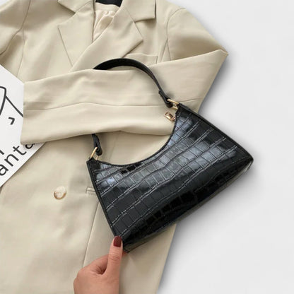 Olivia - Glansig Vegansk Läderhandväska för Stilsäkra Utflykter