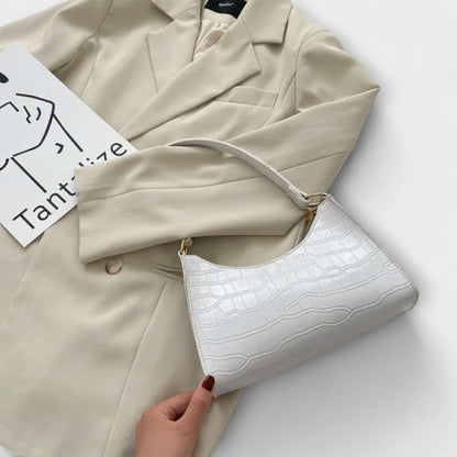 Olivia - Glansig Vegansk Läderhandväska för Stilsäkra Utflykter