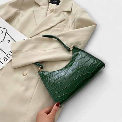 Olivia - Glansig Vegansk Läderhandväska för Stilsäkra Utflykter