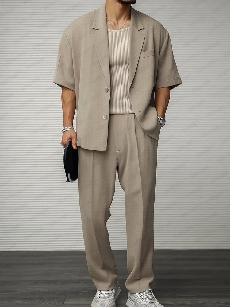 Mans kortärmad blazer och byxensemble för formella och sociala evenemang